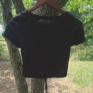 Black open-back crop top